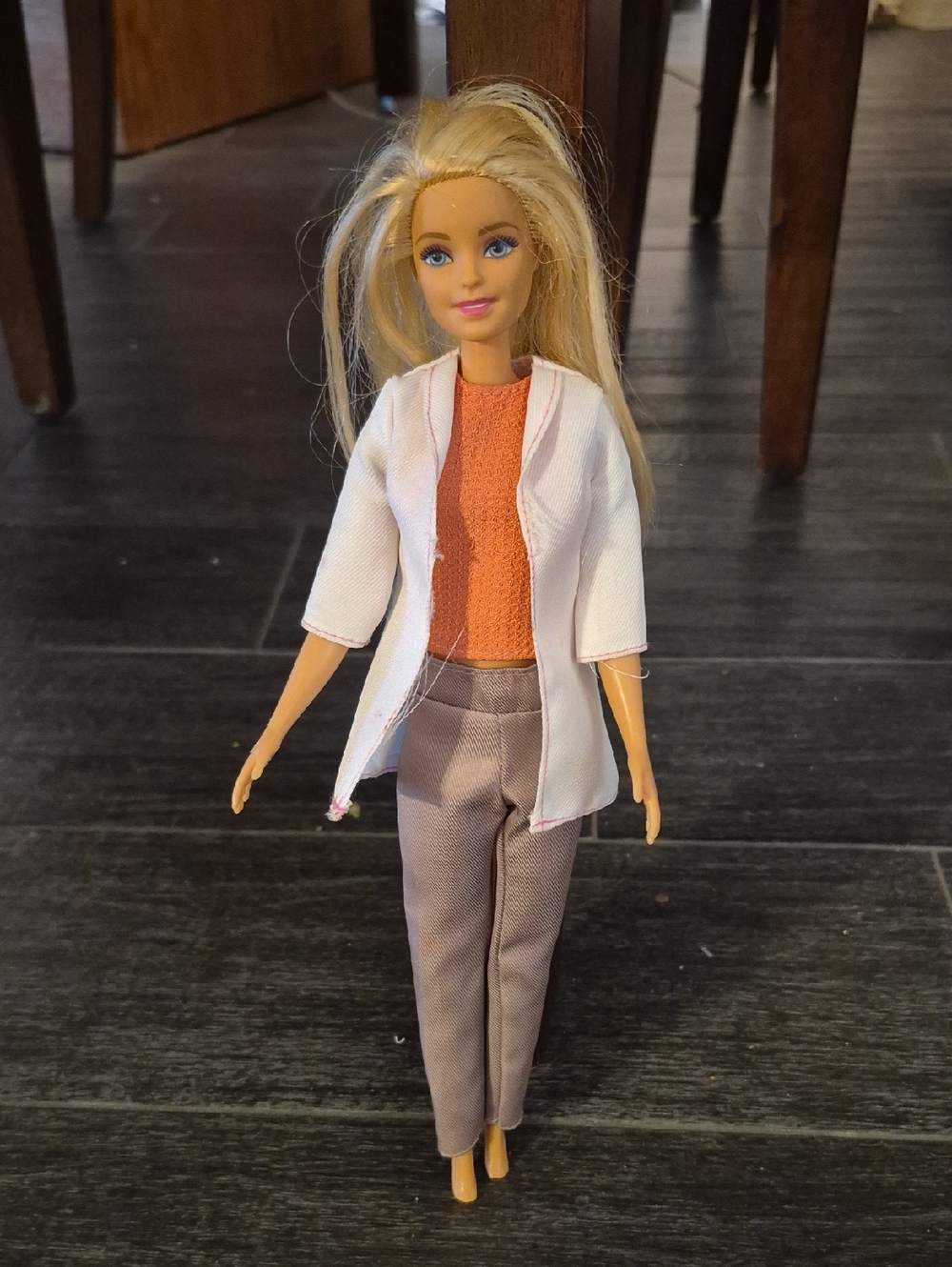 Mattel Blonde Barbie Doll with White Jacket, Orange Top and Tan Pants